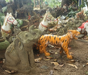 Pile of model animals decorating a shrine
