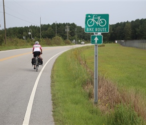 Gill passes bike path sign