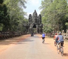 Jo approaches entrance gate in Angkor Wat Complex