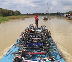 Bikes and Channy on Tonle Sap River