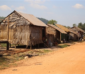 Reed houses on red road to Sihanoukville