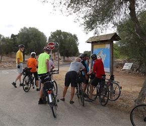 Checking out a roadside Mallorca Cycling Map