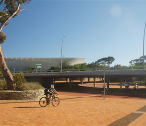 Bruce Whiteside passes the newly completed football stadium for the world cup in Cape Town