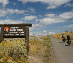 Diane enters Grand Teton along the cycle path