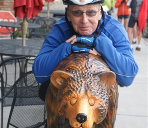 Phil and carved wooden bear