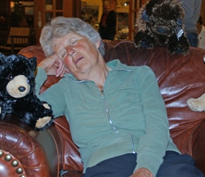 Valerie snoozes with cuddly friends