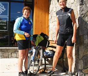 Linda and Carel outside Eastermn Mountain Sports. Like a magnet to cyclists and general outdoor types
