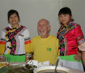 Frank with our waitresses at Ju Hua Inn