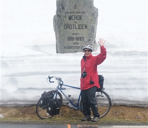 Linda at the marker post showing when it was built