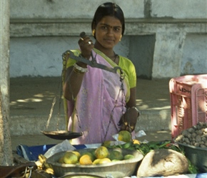 Orange seller. I use these a lot, fresh fruit and a chance to drip feed the local economy