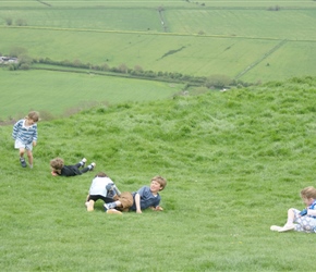 Kate, Edward, James Louise and Lucy rolling down Glastonbury Tor