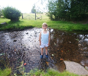 Kate in the stream back at the campsite