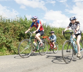 Clare, Morvan and Becky descending from the climb from Clunton