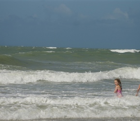 Louise and Kate enjoy the surf at Pirou Plage