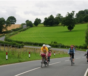 Douglas steams up the hill powered by Catherine on the road to Ludlow