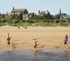 The boys test the water at Alnmouth