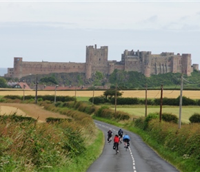 Andy and Jenny descend towards Bamburgh Castle