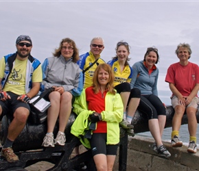 Phil, Haley, Malcolm, Nicola, Sarah, Janice and Neil on a cannon at Bamburgh Castle