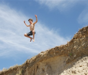 Ed leaping the dunes
