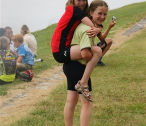 Louise piggybacks Abbie at lunch
