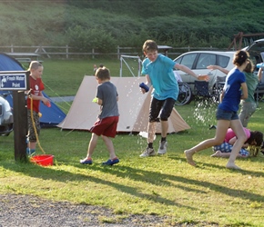 Water fight at the campsite
