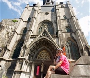 Sarah under Dinant Cathedral