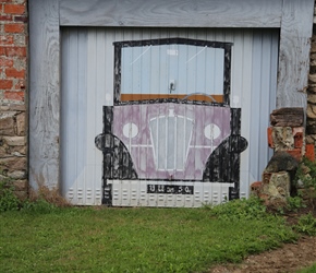 Painted garage door on the way to Périers