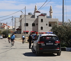 Martyn greets our police escort in Kerak. We had 4 officers that day