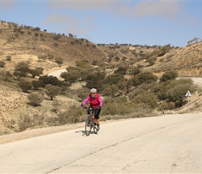 Having taken the short climb from the Kings Highway past the Oak Trees, Mel starts the descent