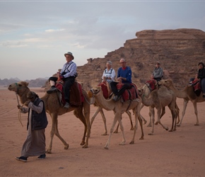 John Sue et al on a camel