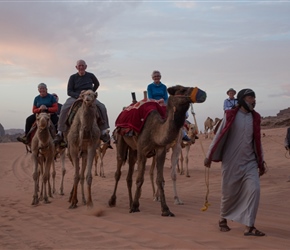 Malc, Carel and Laurinda go for a sunset camel ride