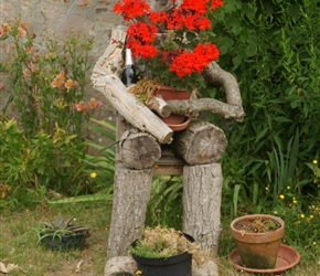 Roadside flowerpot man