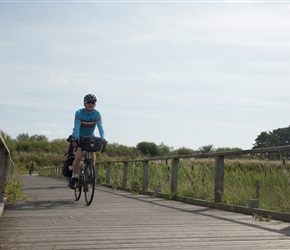 Simon pedalling the boardwalk. Laid here as it was marshy and awetland area
