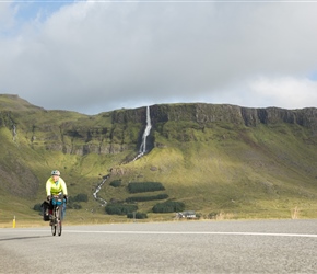 Lorna starts the climb towards Snæfellsjökull National Park with Bjarnarfoss behind