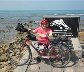Linda at Sakkotei Cape, the official northerly point and start of the 1110km ride south