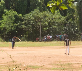 It as Sunday and the crowds were out to watch a cricket game. The aim seems to be to hit the ball as far as possible and this ball in this picture was lost in the undergrowth