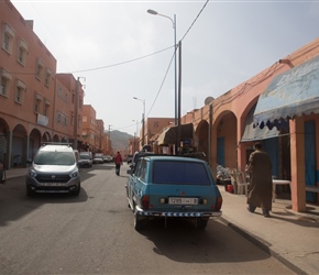 The main street in Souk El Arba Du Sahal. Morocco is the graveyard for old French cars, in this case a Renault 12