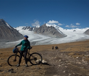 Sharon in front of Khüiten Peak and glacier