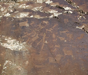 Petroglyths. Rock carvings scrawled into the rock face. 11000 - 6000 BC