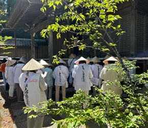 A group of pilgrims arrive at Yakuōji Temple