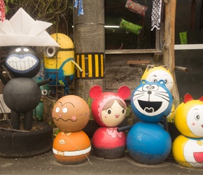 Various Japanese cartoon creatures created out of boat buoys