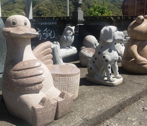 Wonderfully comic statues by the roadside
