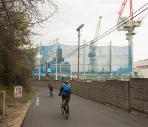 Having bought lunch, we headed along the southern edge of Innoshima Island. The smell of paint was in the air as cars were covered in polythene and huge ships were being sprayed