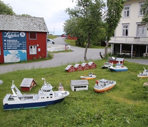 Model ships at A decorate the village square