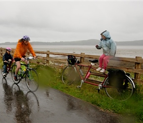 Louise encourages Clare and Morven that it wasn't her idea but her fathers to cycle in the rain