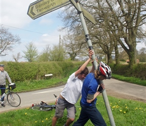 So the sign was falling over. Being a proud cycling citizen, Ed thought he'd try to rectify this
