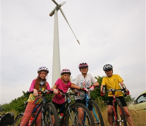 Alice, Freya, Erica and Jacob under the windmill