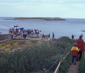 Descending to take the boat to the Farne Islands
