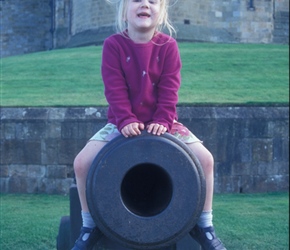 Louise checks out the cannon at Alnwick Castle
