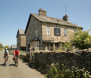 Marcus and Martin pass the tearoom at Barbon. 